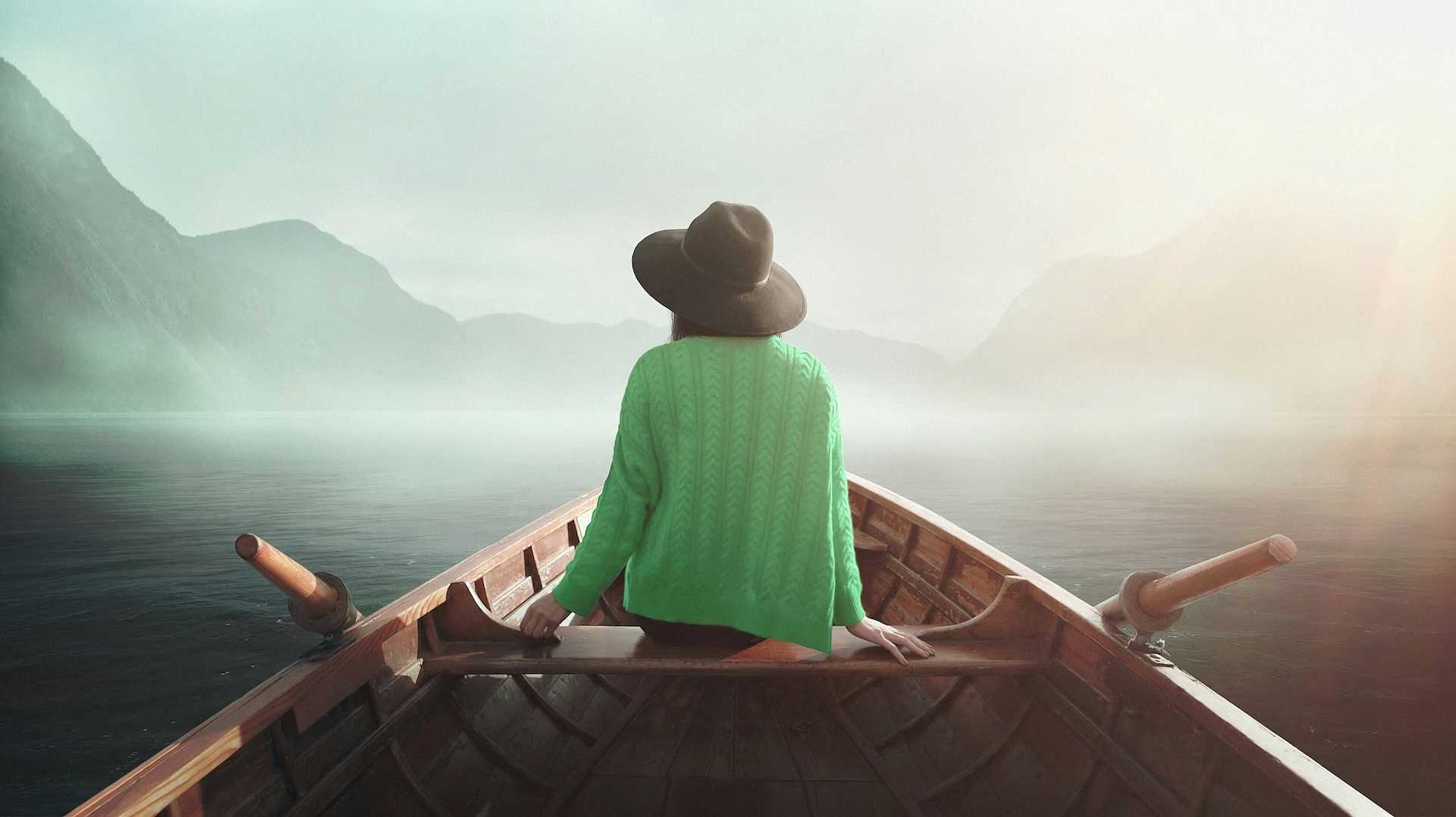Woman on a boat in a fog